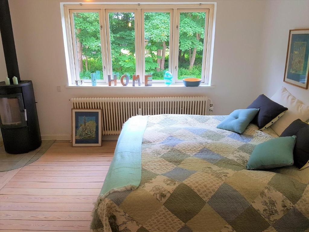 Postel nebo postele na pokoji v ubytování Koege Guesthouse