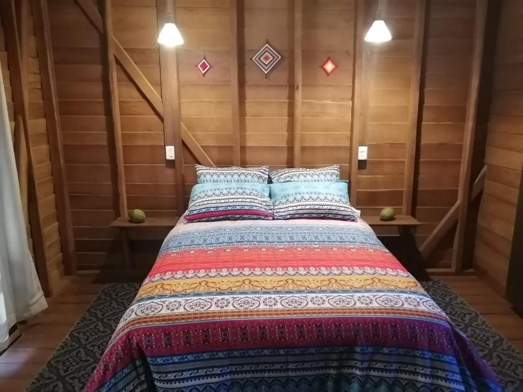 Postel nebo postele na pokoji v ubytování El Regalo El Cuyo