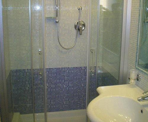 Koupelna v ubytování Hotel Dina