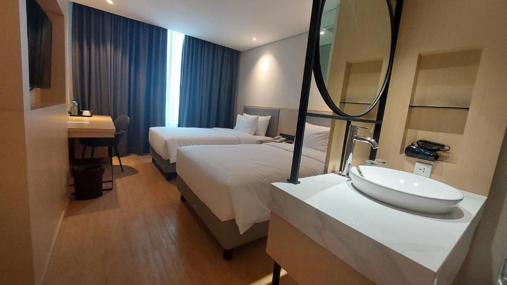 Hotel Eastern Bojonegoro - Luxe Tweelingzaal