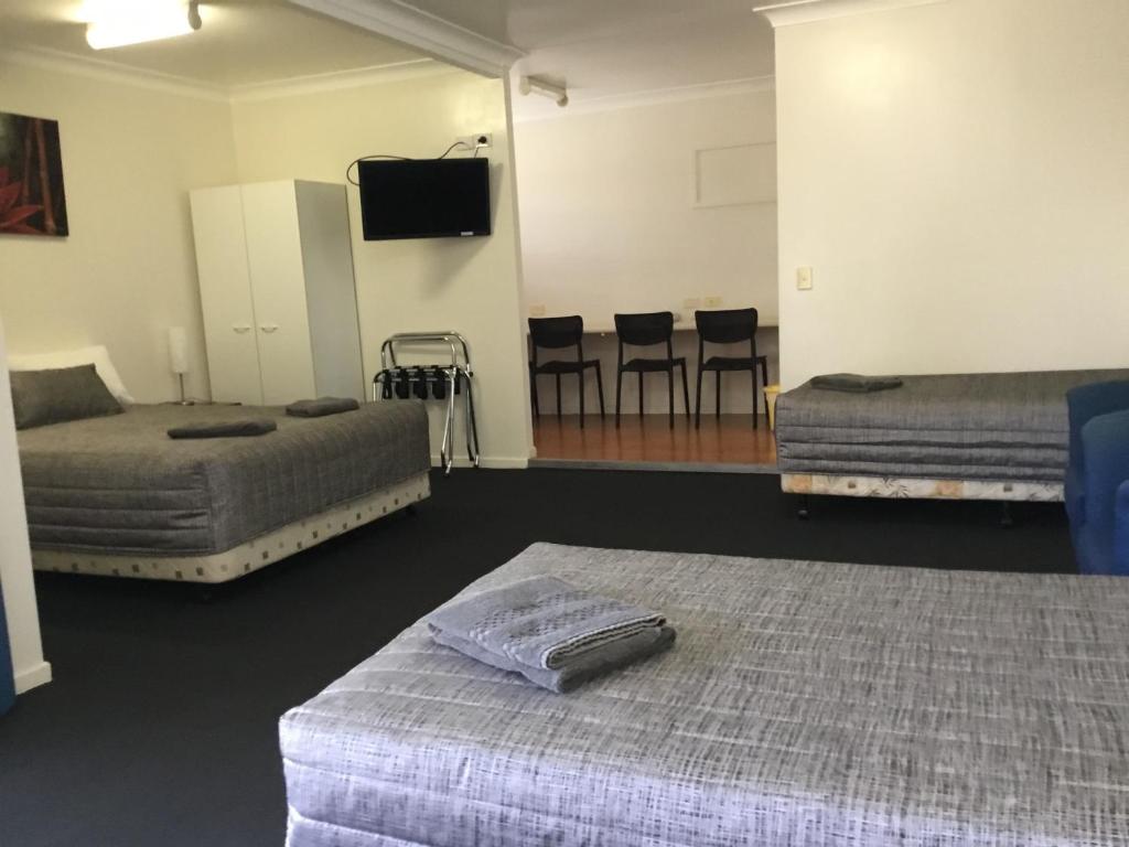 Postel nebo postele na pokoji v ubytování Charleville Waltzing Matilda Motor Inn