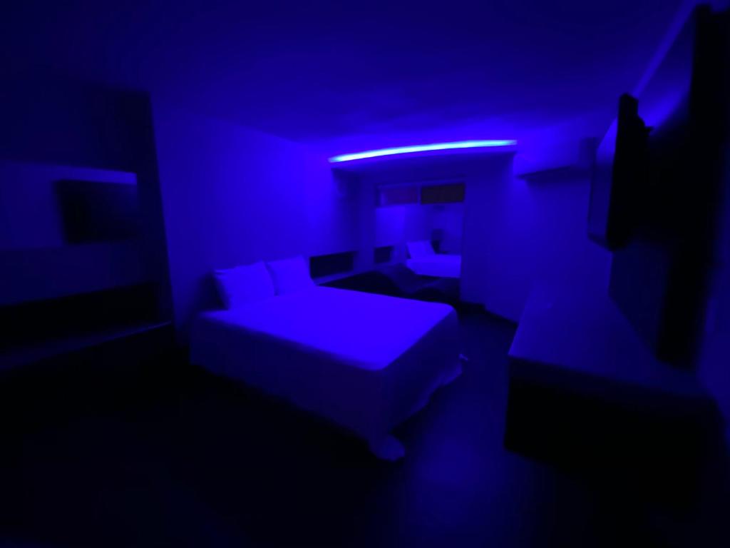 Postel nebo postele na pokoji v ubytování Motel Encuentro