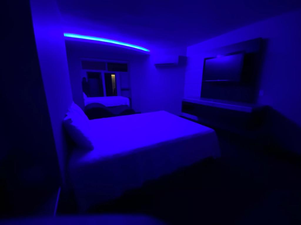 Postel nebo postele na pokoji v ubytování Motel Encuentro