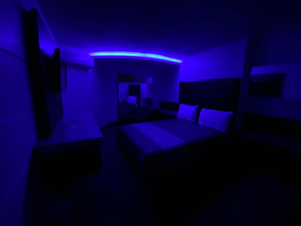 Postel nebo postele na pokoji v ubytování Motel Encuentro