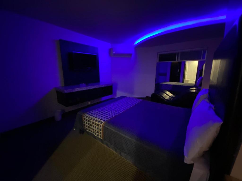 Postel nebo postele na pokoji v ubytování Motel Encuentro