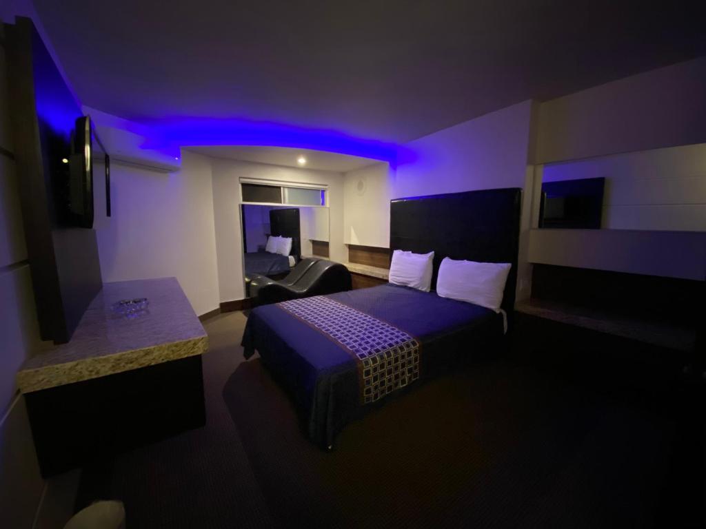 TV a/nebo společenská místnost v ubytování Motel Encuentro