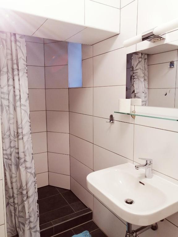 Koupelna v ubytování Apartmenthaus beim LKH Graz