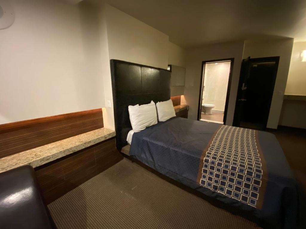 Postel nebo postele na pokoji v ubytování Motel Encuentro