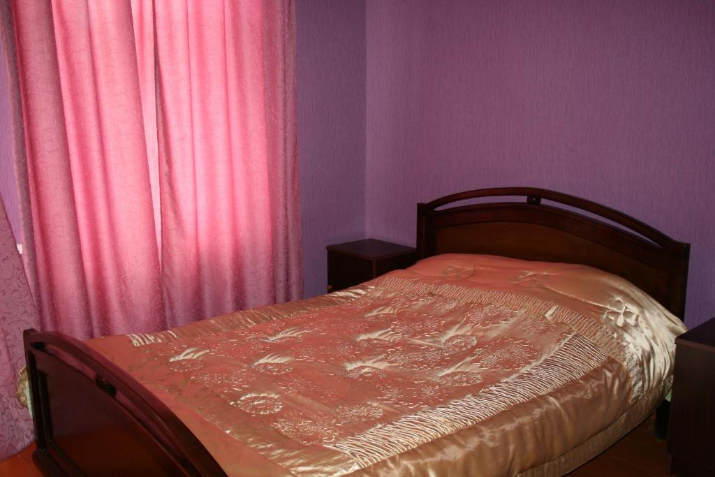 Postel nebo postele na pokoji v ubytování Guesthouse Gegi