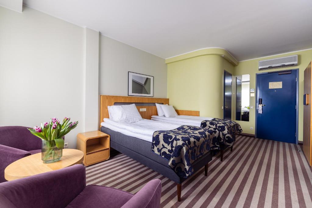 Voodi või voodid majutusasutuse Hotel Soho toas
