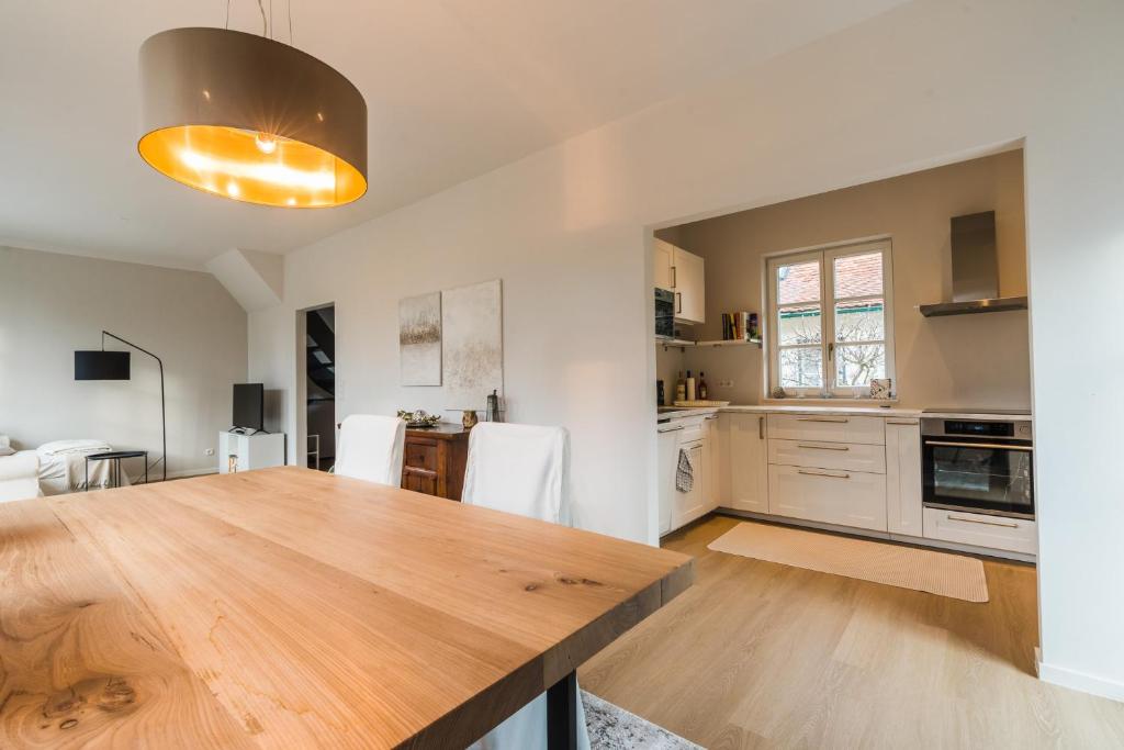 Kuchyň nebo kuchyňský kout v ubytování Appartement HIMMEL & Höllerl