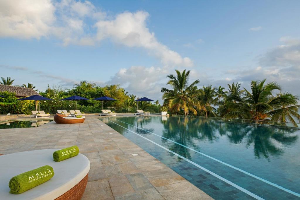 Bazén v ubytování Melia Zanzibar nebo v jeho okolí