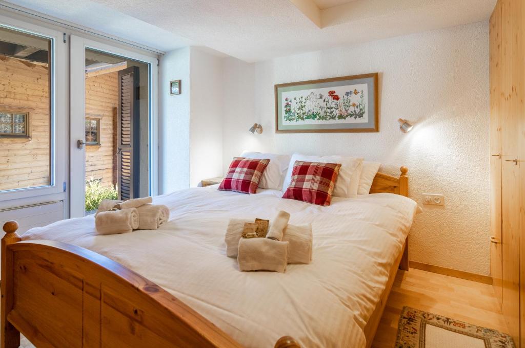 Postel nebo postele na pokoji v ubytování Chalet Schweizerhof 1