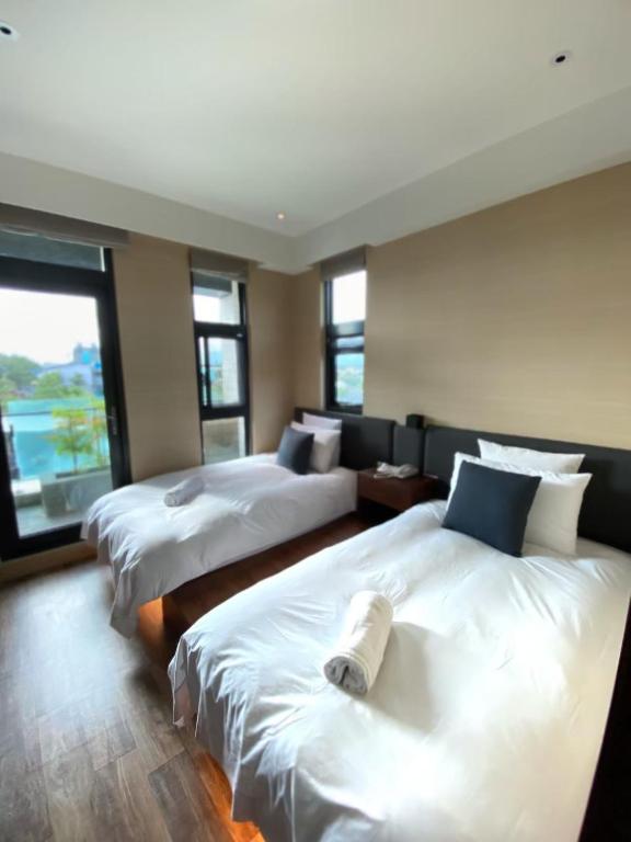 Postel nebo postele na pokoji v ubytování Tsang Kuo Resort
