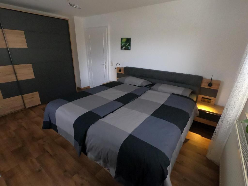 Postel nebo postele na pokoji v ubytování Fewo Bauer