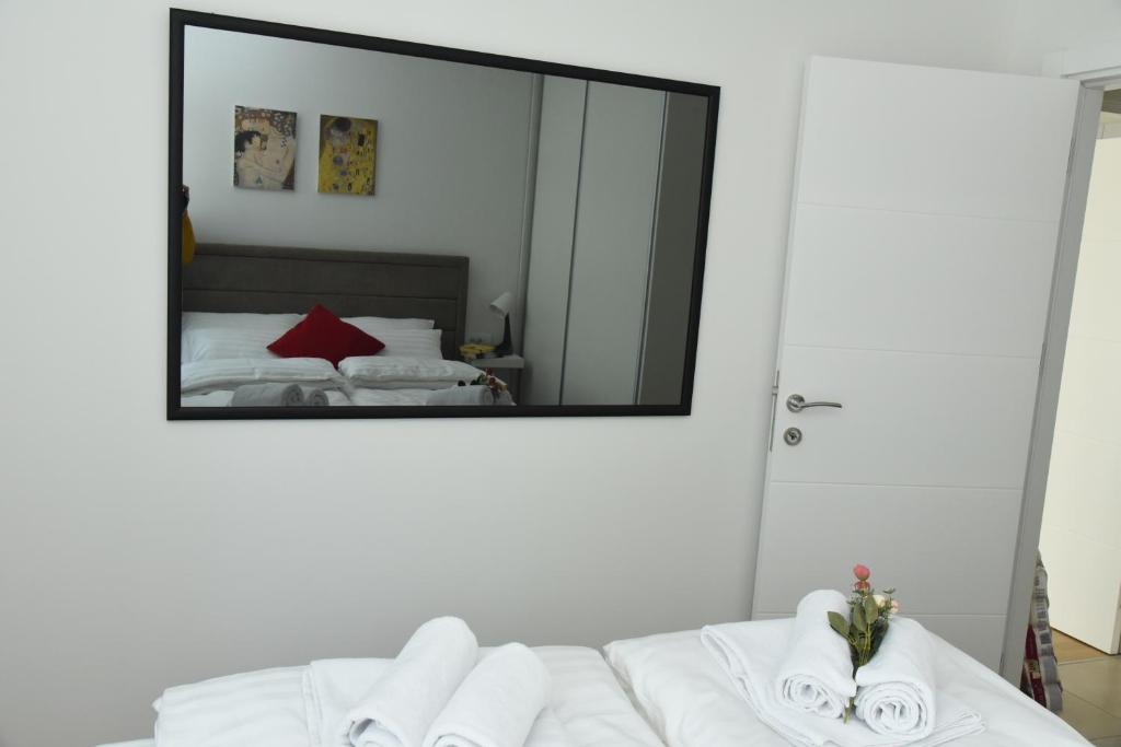 Krevet ili kreveti u jedinici u okviru objekta Suncokret Apartmani Loznica