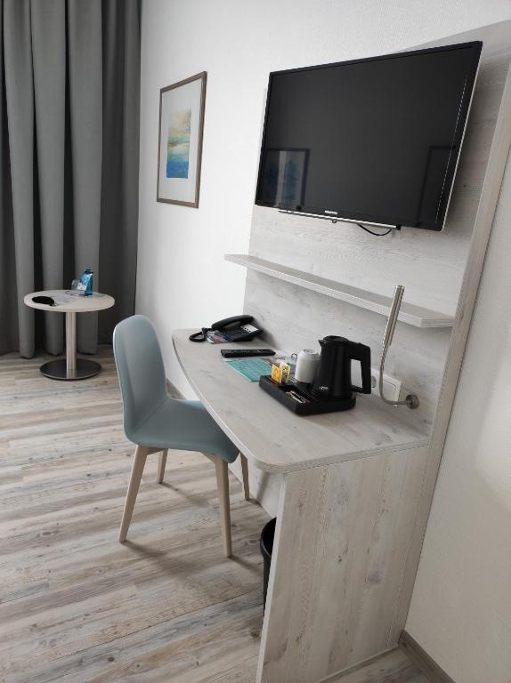 TV a/nebo společenská místnost v ubytování Nordsee Hotel Borkum