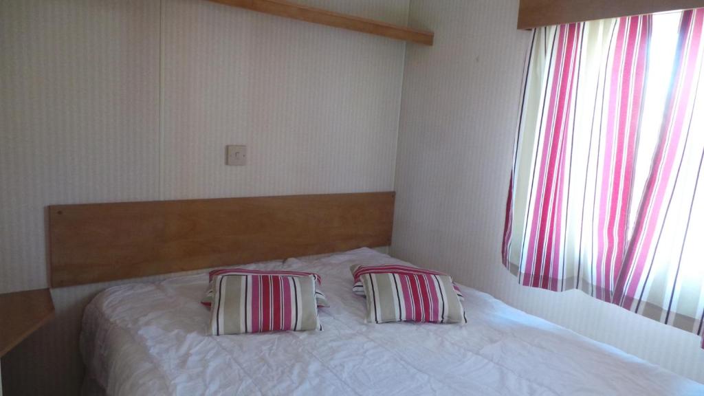 Postel nebo postele na pokoji v ubytování Mobilhome 1 calme et tranquilité