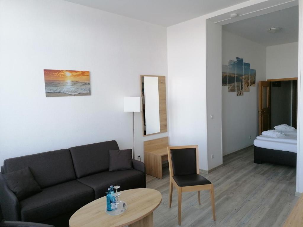 Postel nebo postele na pokoji v ubytování Nordsee Hotel Borkum