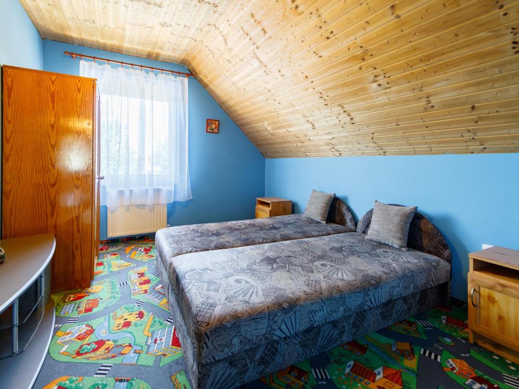 Łóżko lub łóżka w pokoju w obiekcie Apartment Scarlett 2 by Interhome
