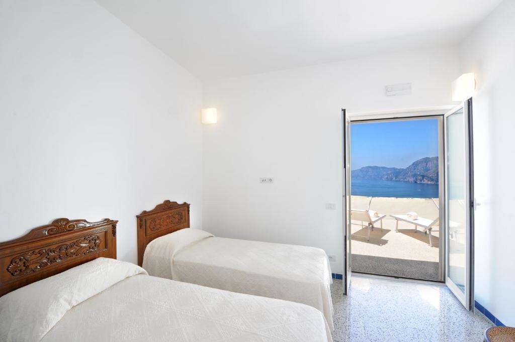 Posteľ alebo postele v izbe v ubytovaní My Shazzy with amazing Sea View terrace