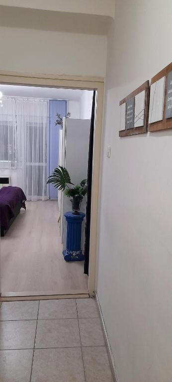 Posteľ alebo postele v izbe v ubytovaní Pécs Central
