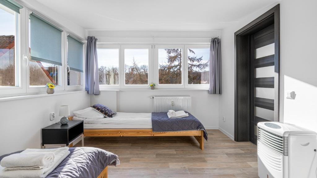 Posteľ alebo postele v izbe v ubytovaní Sunny - BillBerry Apartments