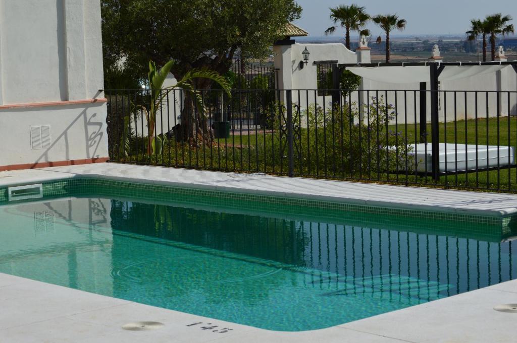 Bazén v ubytování Hacienda Montija Hotel nebo v jeho okolí