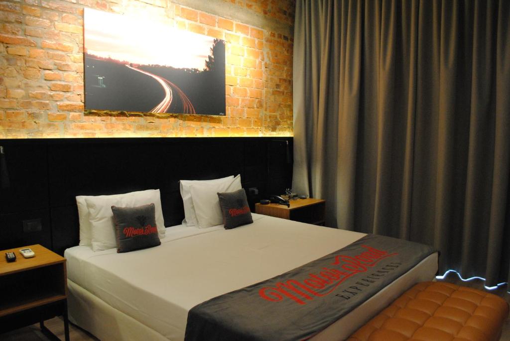 Postel nebo postele na pokoji v ubytování Planalto Select Hotel Ponta Grossa