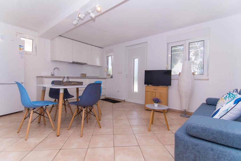 Kuchyňa alebo kuchynka v ubytovaní Apartments Lumini