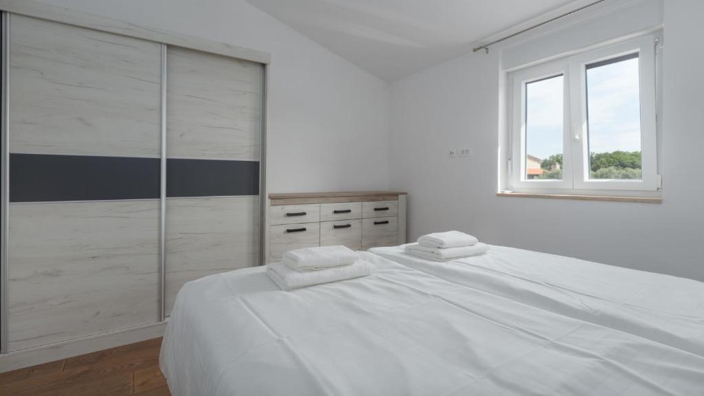 Posteľ alebo postele v izbe v ubytovaní Villa Alcove with breathtaking Sea View and Private Pool