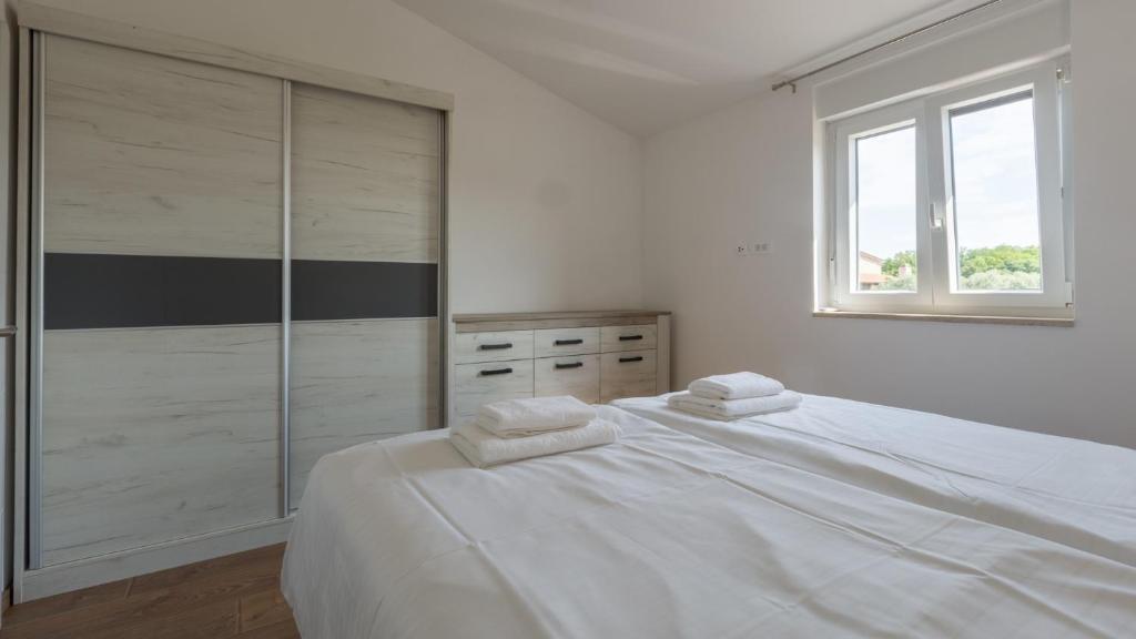 Posteľ alebo postele v izbe v ubytovaní Villa Alcove with breathtaking Sea View and Private Pool
