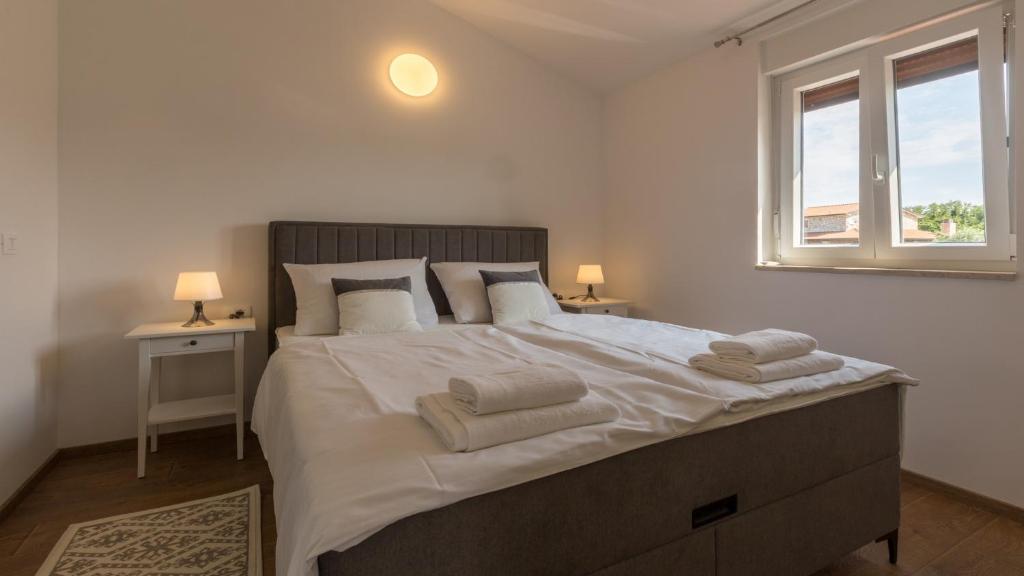 Posteľ alebo postele v izbe v ubytovaní Villa Alcove with breathtaking Sea View and Private Pool