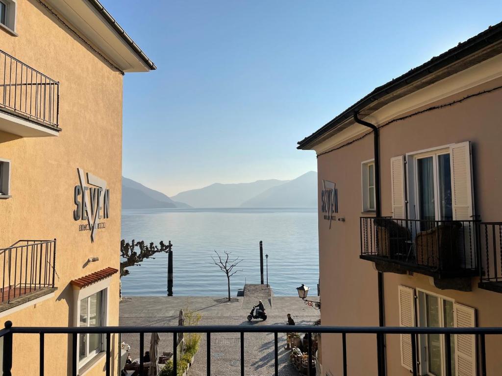 a view of the water from between two buildings at Ascona: CÀ DAL DOLZ in Ascona