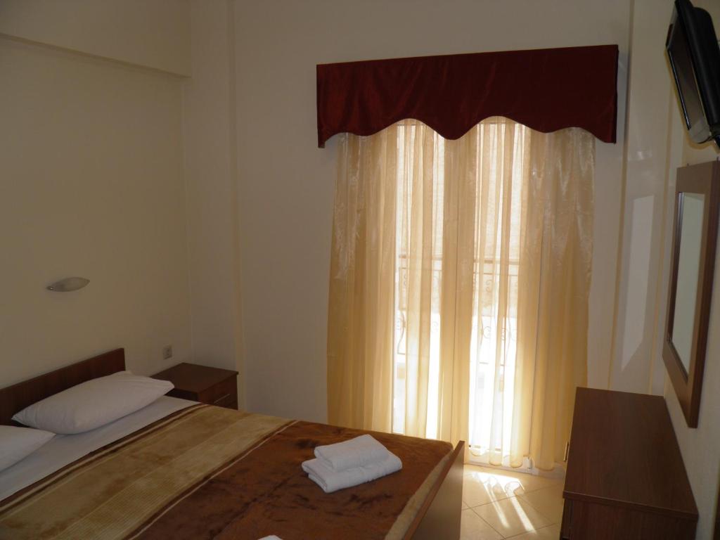 Postel nebo postele na pokoji v ubytování Anatolia Studios