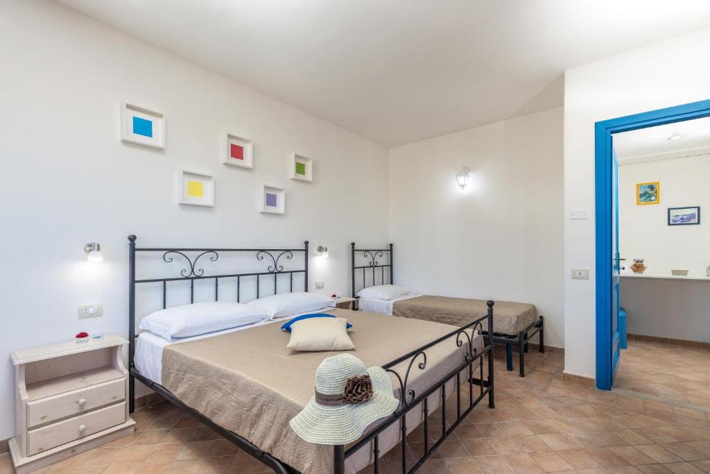 Postel nebo postele na pokoji v ubytování H14 Porto Frailis