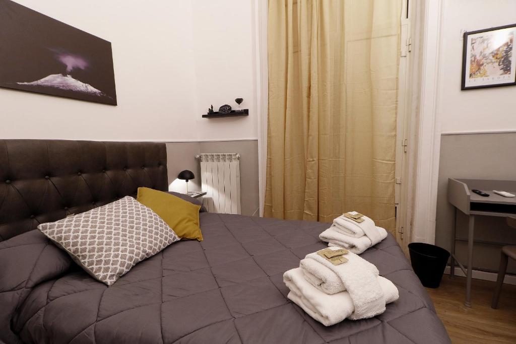 Łóżko lub łóżka w pokoju w obiekcie CentroCittà Comfort