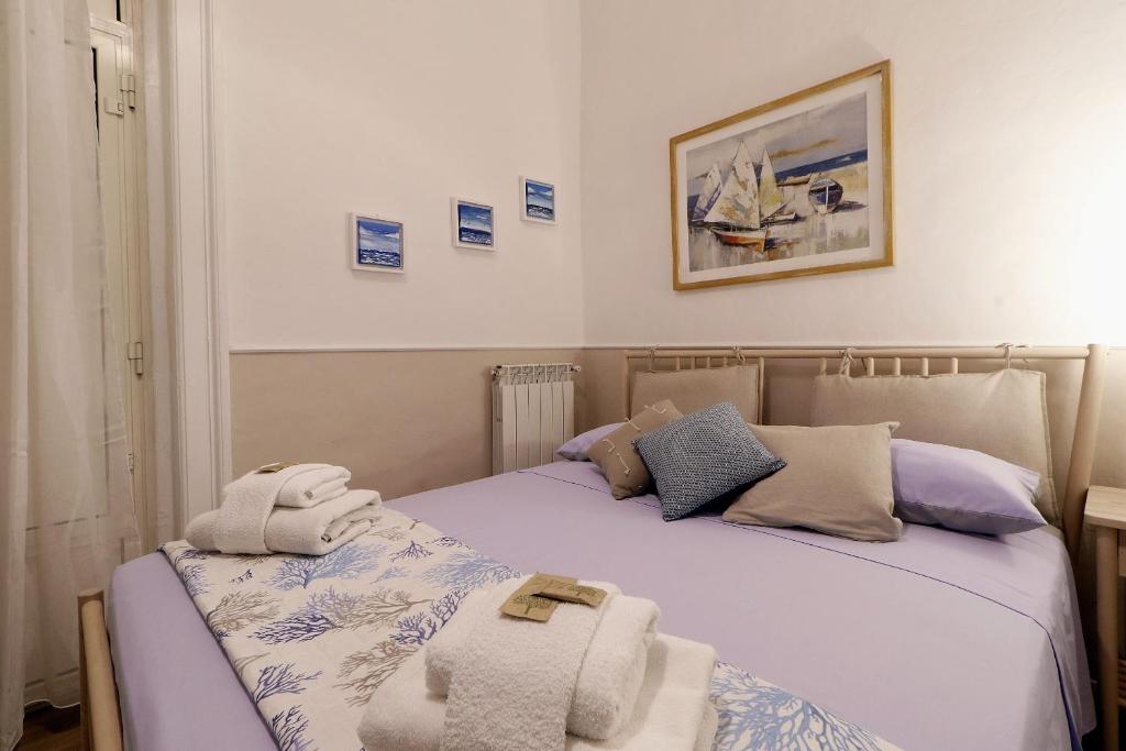 Łóżko lub łóżka w pokoju w obiekcie CentroCittà Comfort