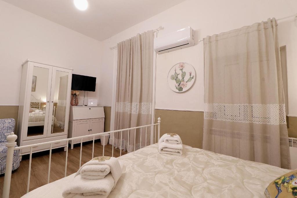 Łóżko lub łóżka w pokoju w obiekcie CentroCittà Comfort