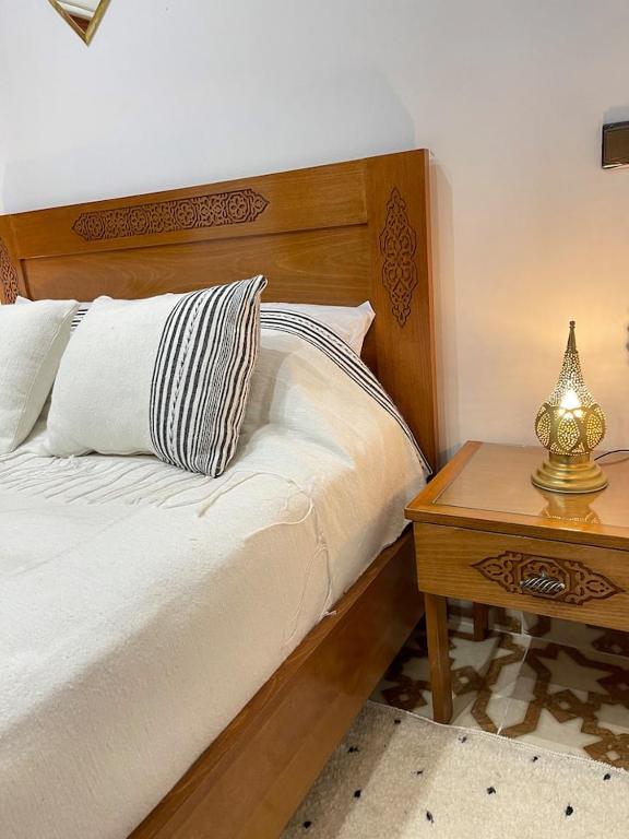 Postel nebo postele na pokoji v ubytování Riads Dar ZAO - logements entiers