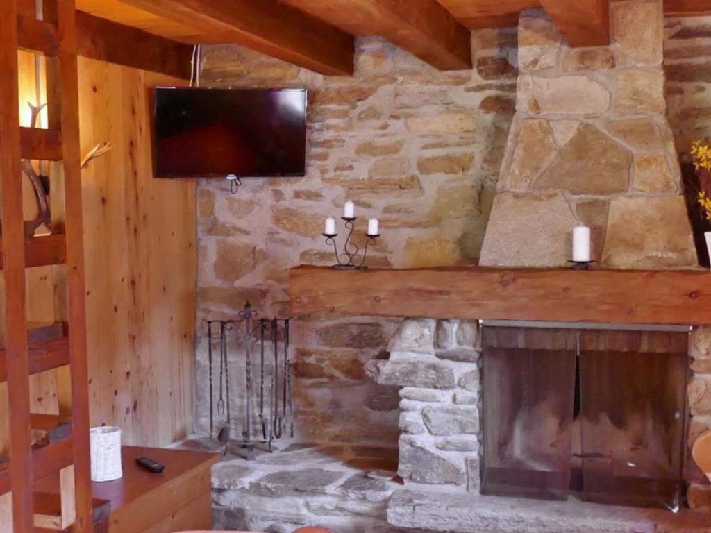 TV a/nebo společenská místnost v ubytování Holiday Home Rustico Fey by Interhome