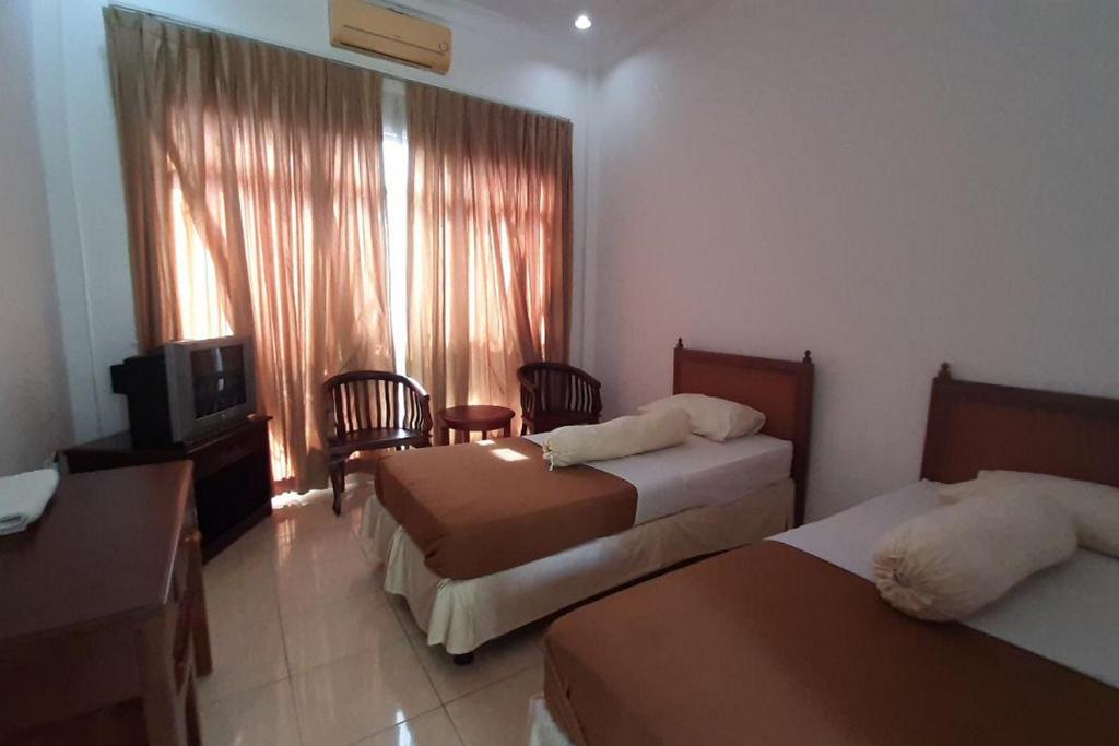 Hotel Akbar Syariah Banyumas RedPartner - ツインルーム
