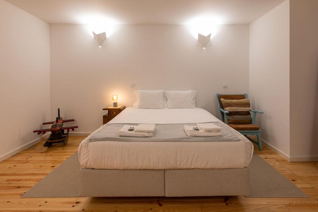 Ένα ή περισσότερα κρεβάτια σε δωμάτιο στο ORM Torrinha Apartment
