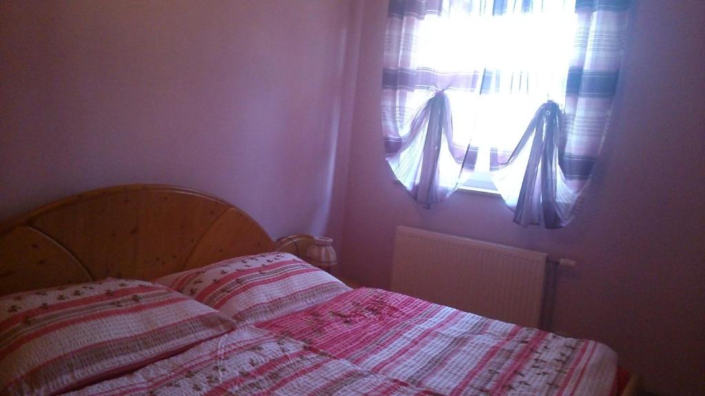 Postel nebo postele na pokoji v ubytování Ferienwohnung Pezi
