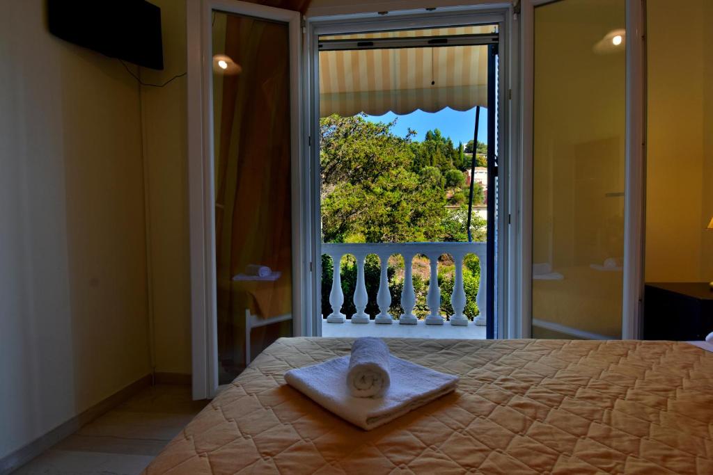 Кровать или кровати в номере Delfini Resort