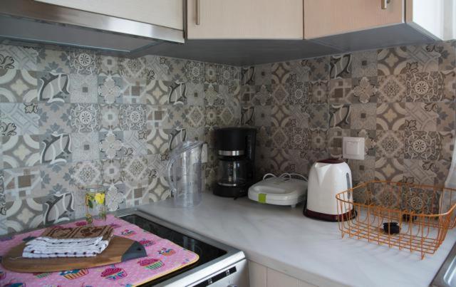 Kuchyň nebo kuchyňský kout v ubytování Efi Apartments