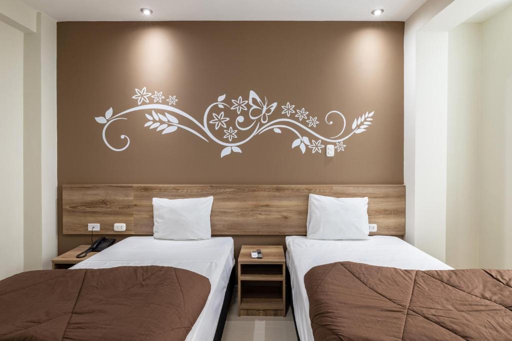 Voodi või voodid majutusasutuse Hotel Solec Piura toas
