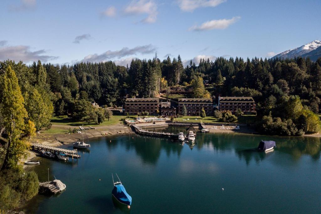 an aerial view of a resort on a lake at Bahía Manzano Resort in Villa La Angostura