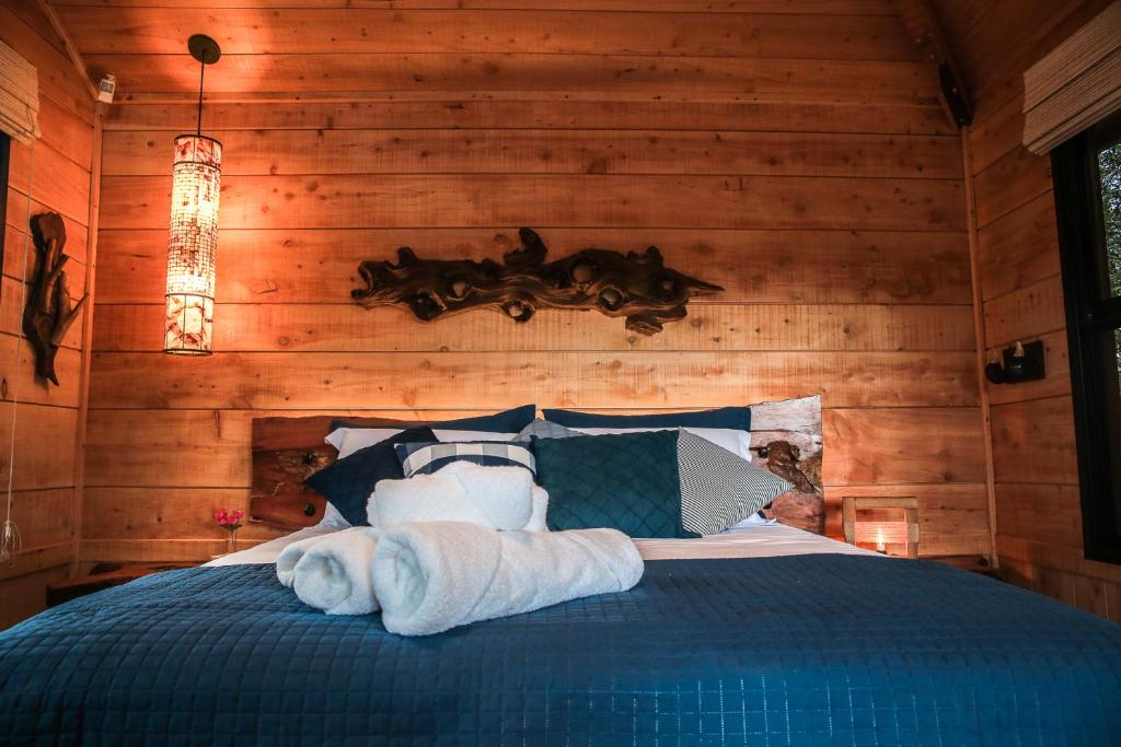 Postel nebo postele na pokoji v ubytování Casa na Árvore Morada dos Vagalumes