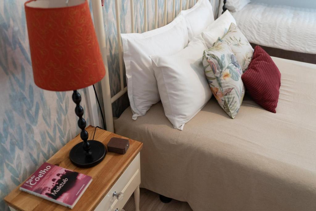 A bed or beds in a room at Casa rural La bodega